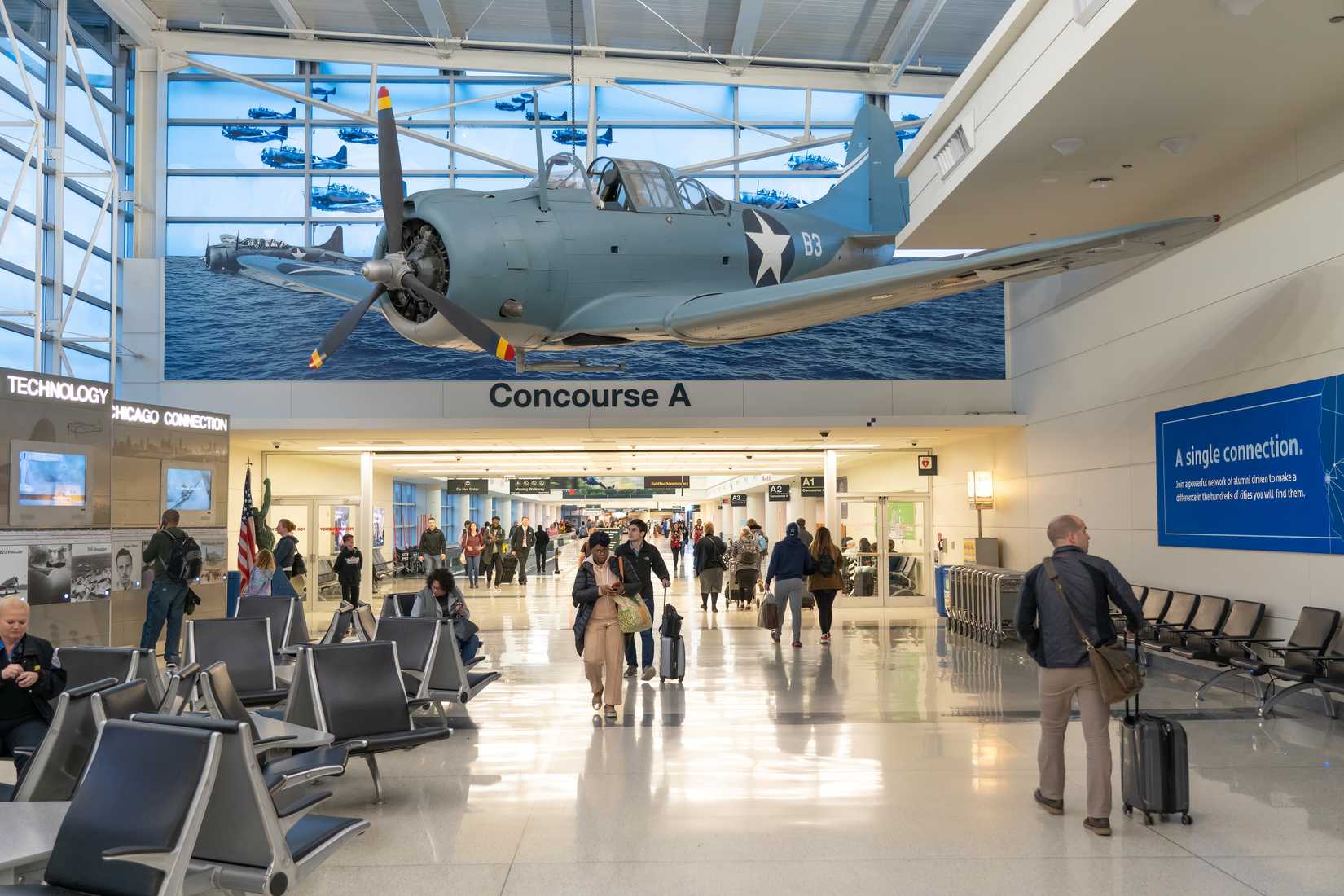 In concourse A of the Midway International airport, an SBD Dauntless dive-bomber.