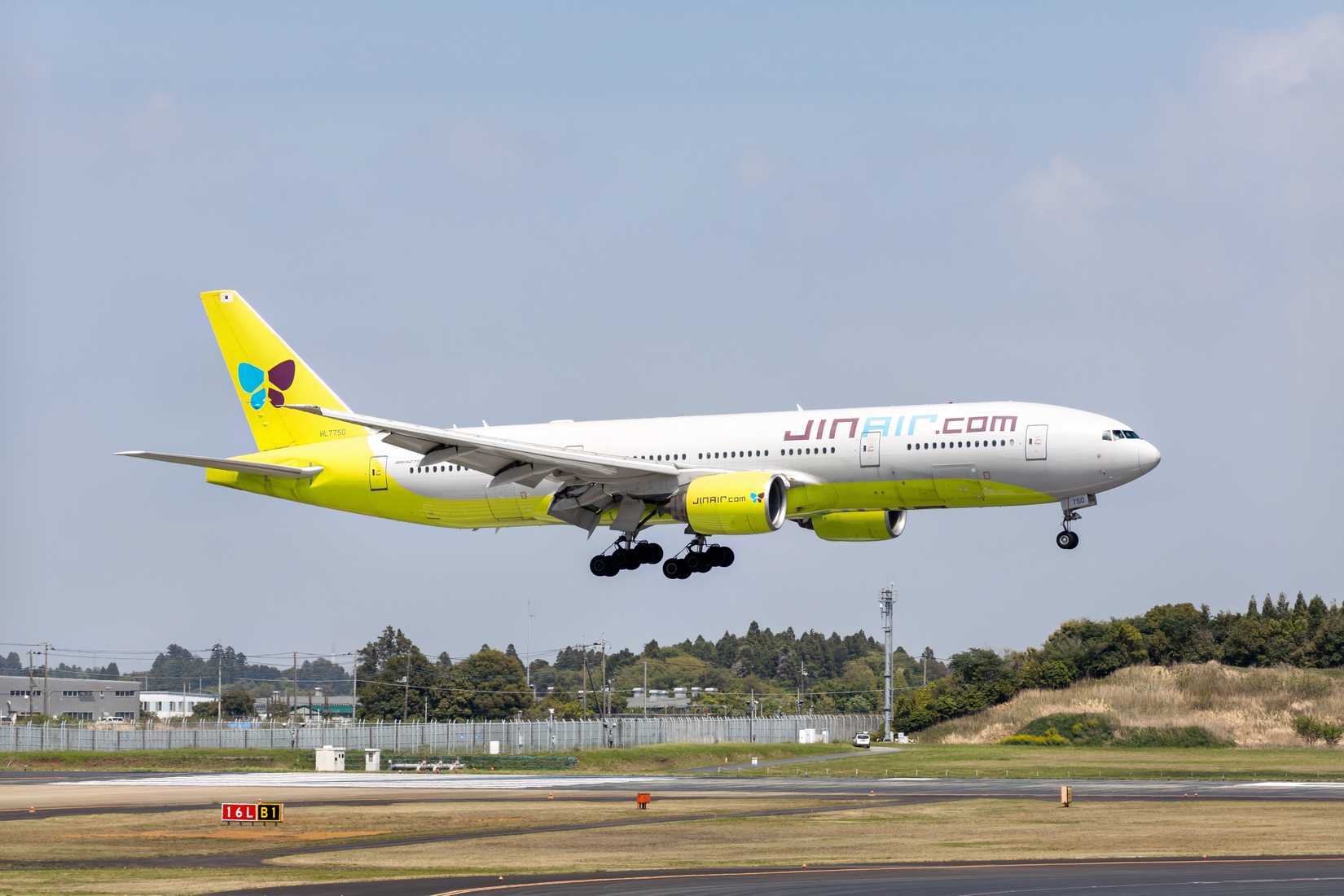 Jin Air Boeing 777-200ER on short final after another flight