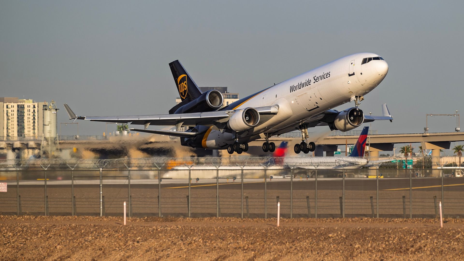 nited Parcel Service McDonnell Douglas MD-11F N253UP morning departure from 7L at Phoenix Sky Harbor International Airport