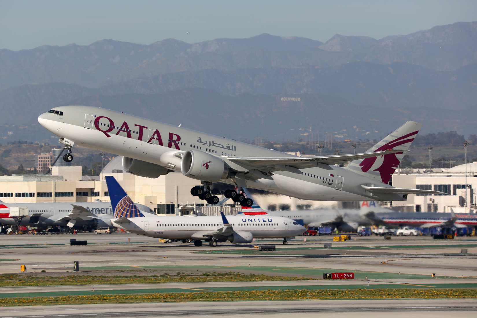 Qatar Airways Boeing 777-200LR takes off
