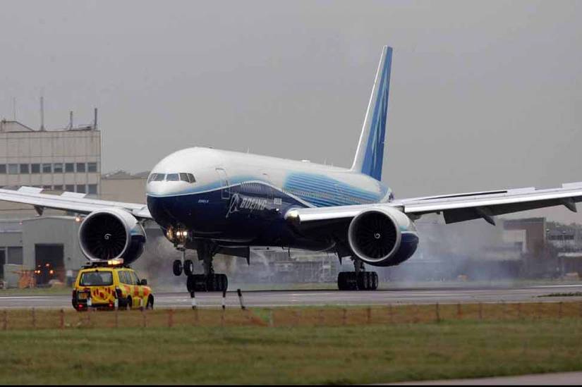 Record setting Boeing 777-200LR lands in London