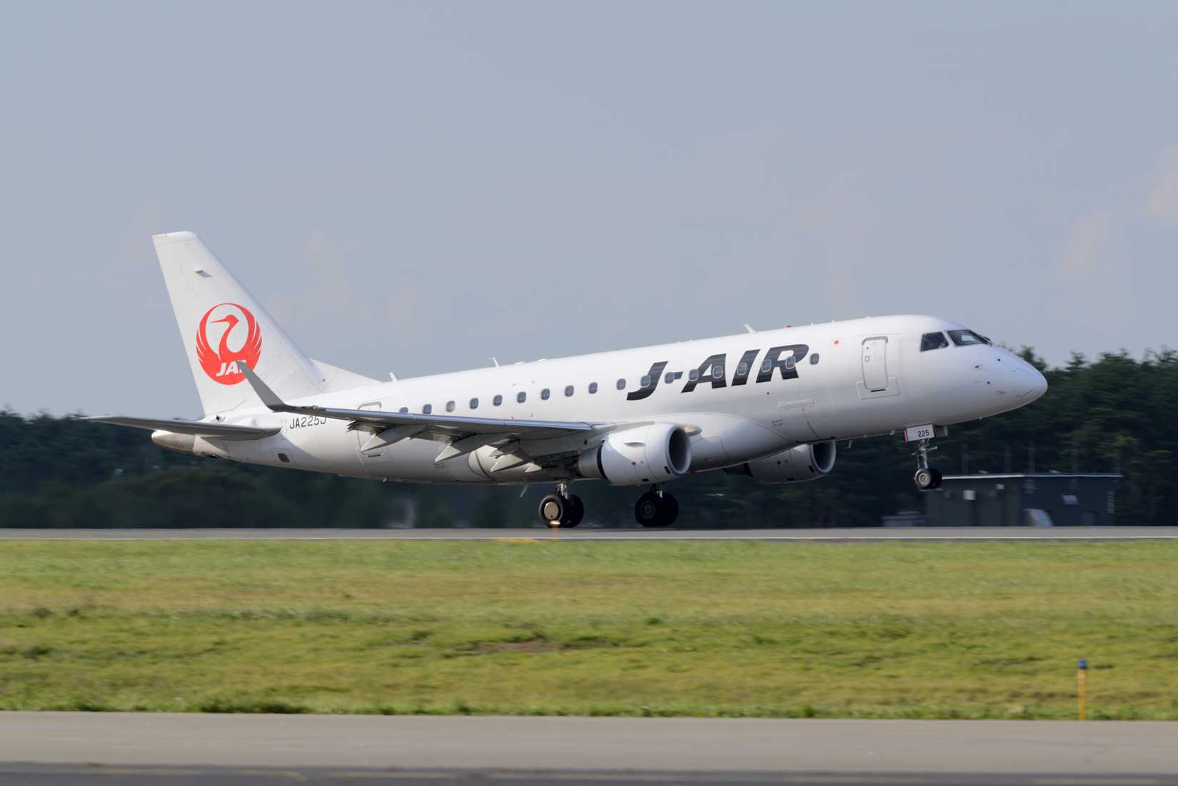 A Japan Airlines Embraer E170 taking off