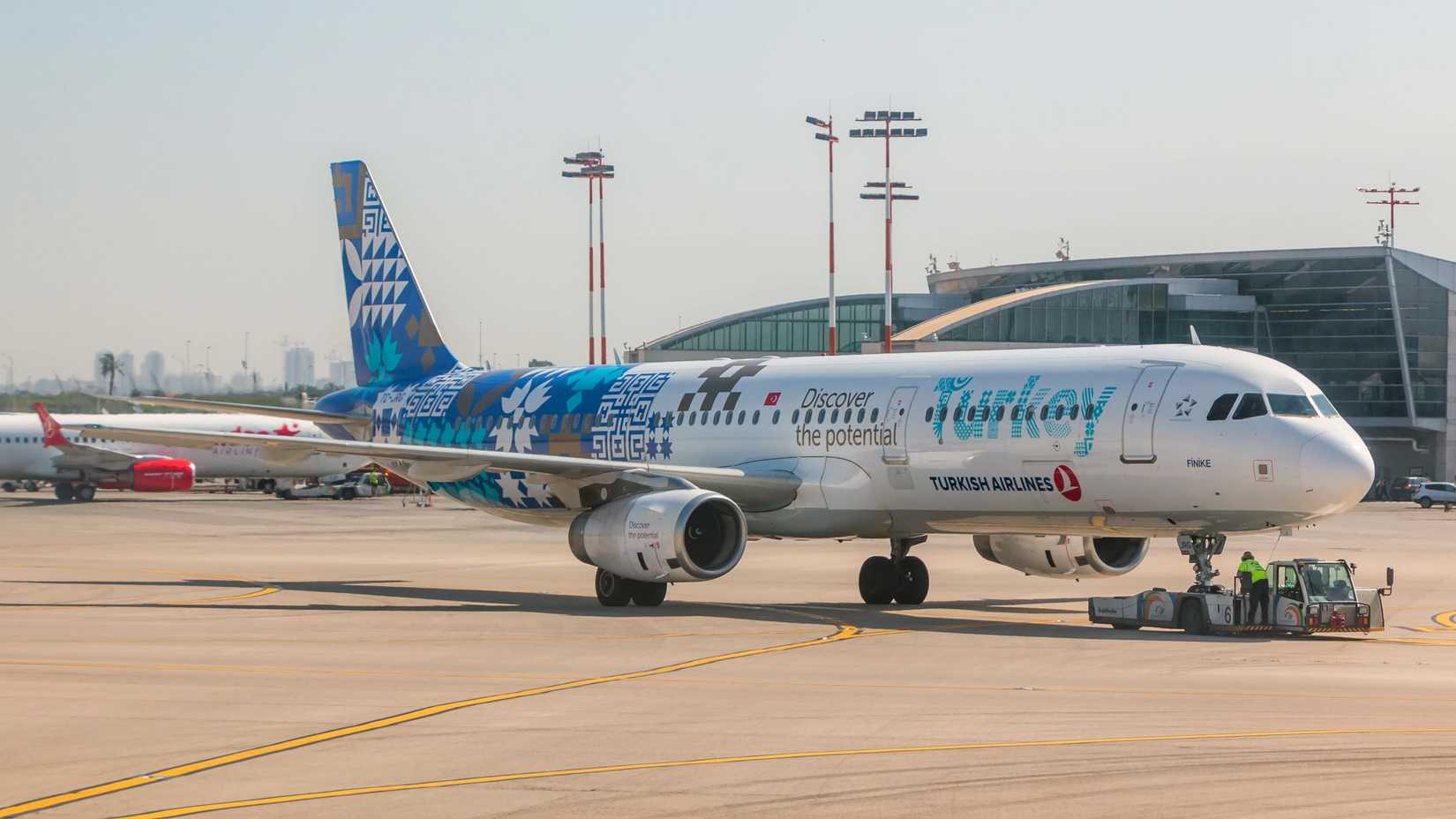 Turkish Airlines Airbus A321 with "discover the potential" special livery during pushback in Ben Gurion Airport