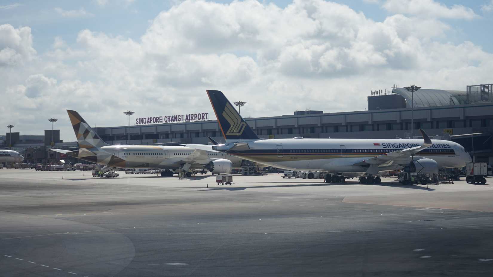 Singapore Airlines Airbus A350-900 And Etihad Airways Boeing 787-9 Parked