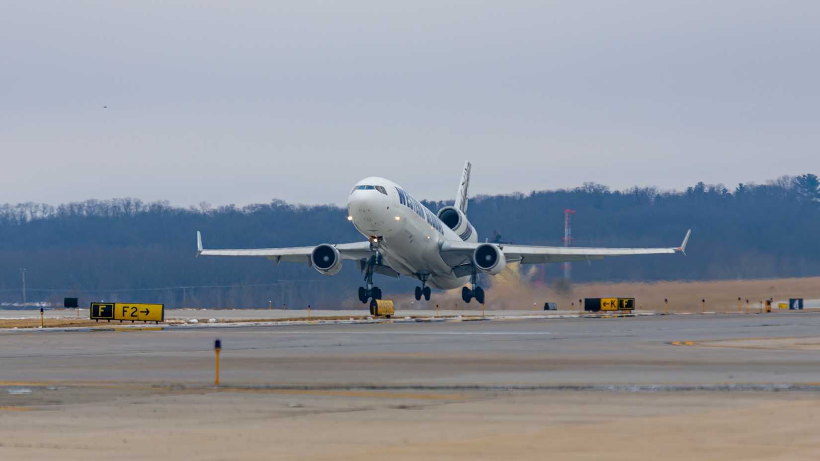 A Western Global Airlines McDonnell Douglas MD-11 taking off
