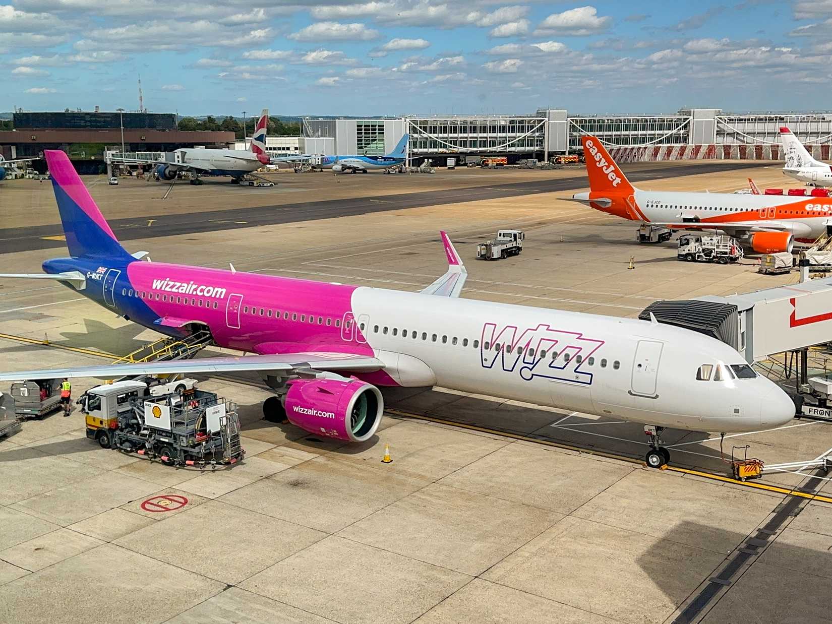 Wizz Air Airbus A321 aircraft parked at the gate at London Gatwick Airport 