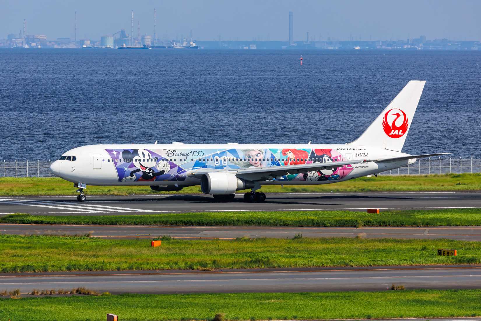 Japan Airlines Boeing 767-300ER airplane with Disney 100 special livery at Tokyo Haneda Airport