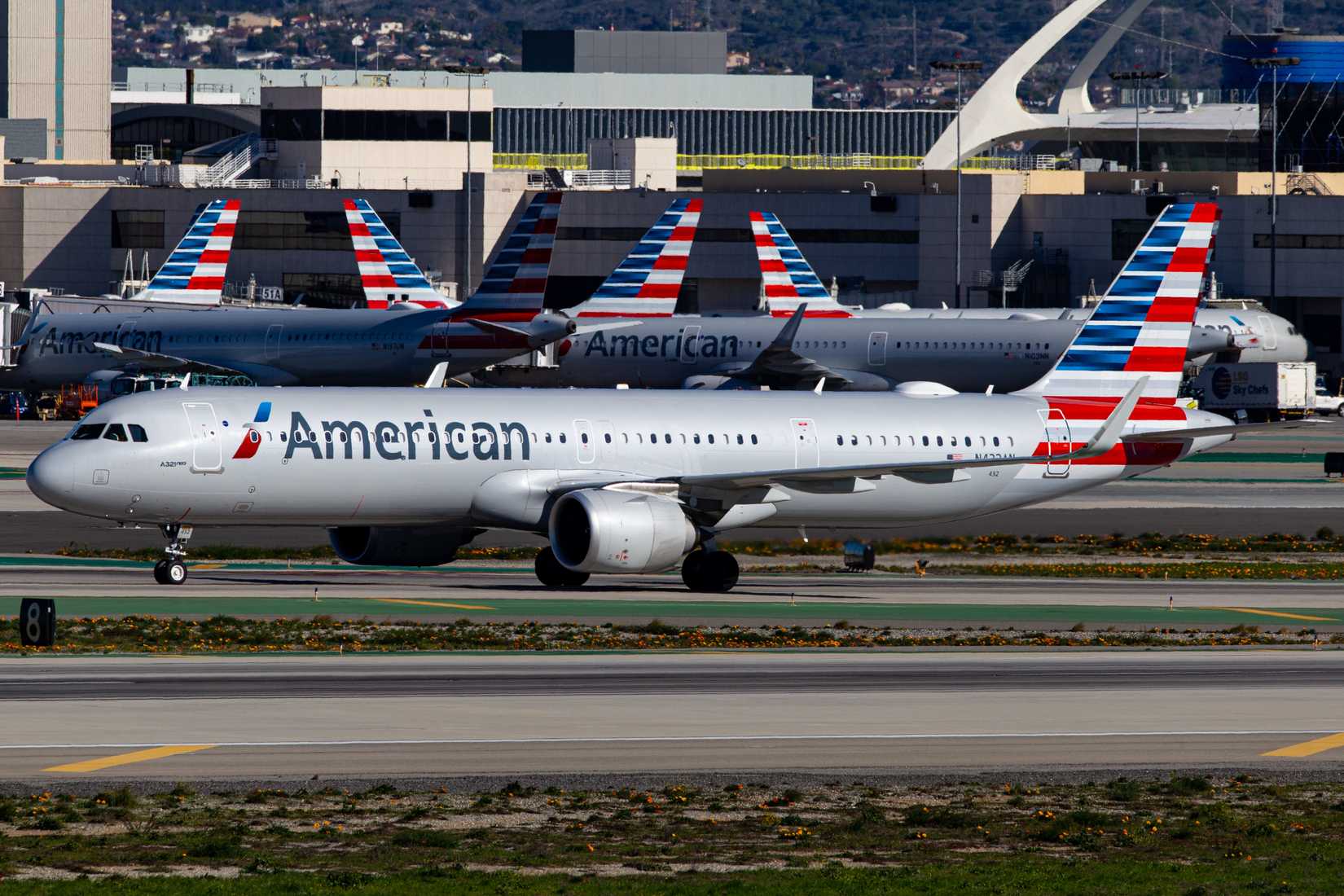 American Airlines A321neo and other AA planes in the background
