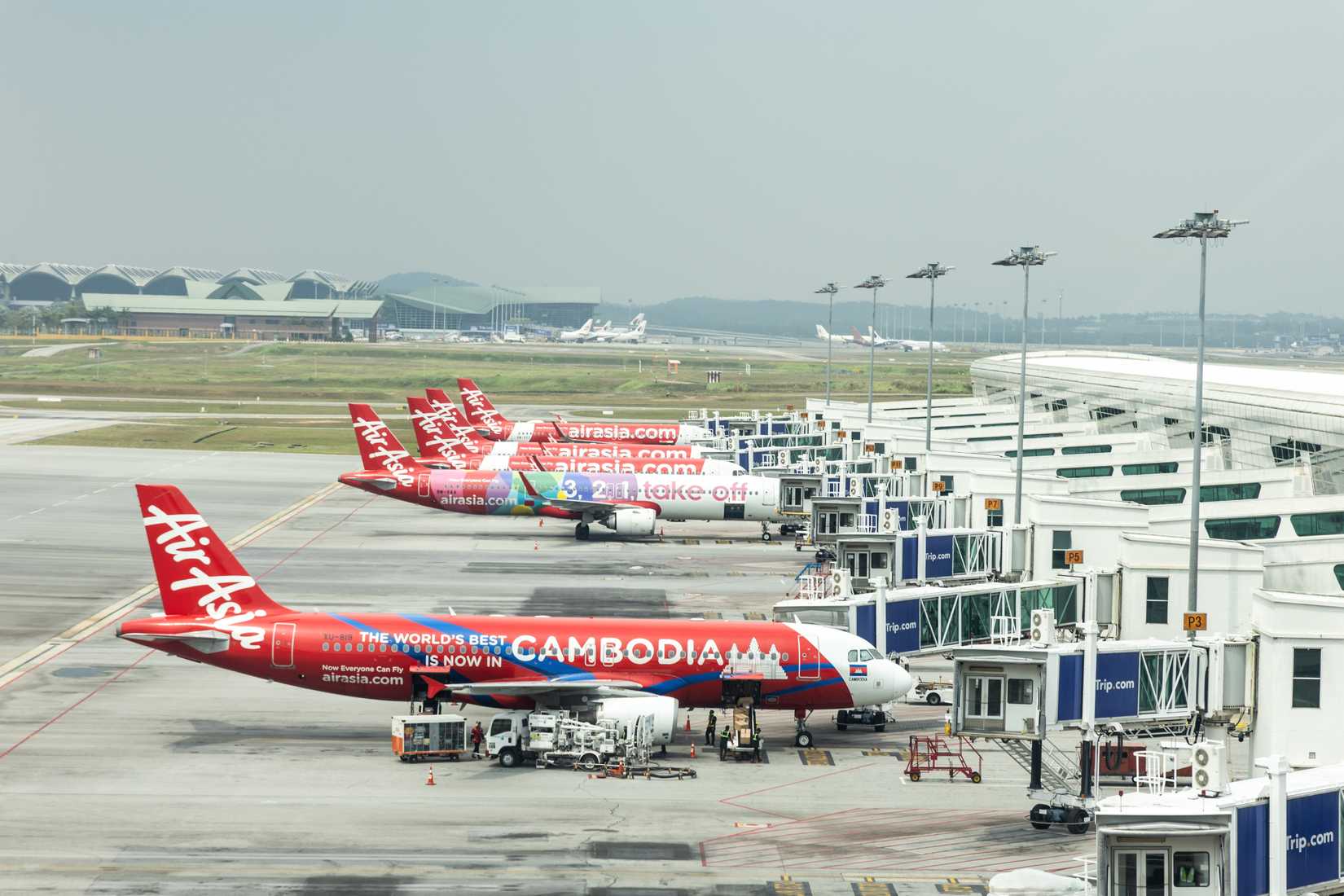 AirAsia Airbus aircrafts are docked at the KLIA 2 terminal in Malaysia, ready for departure