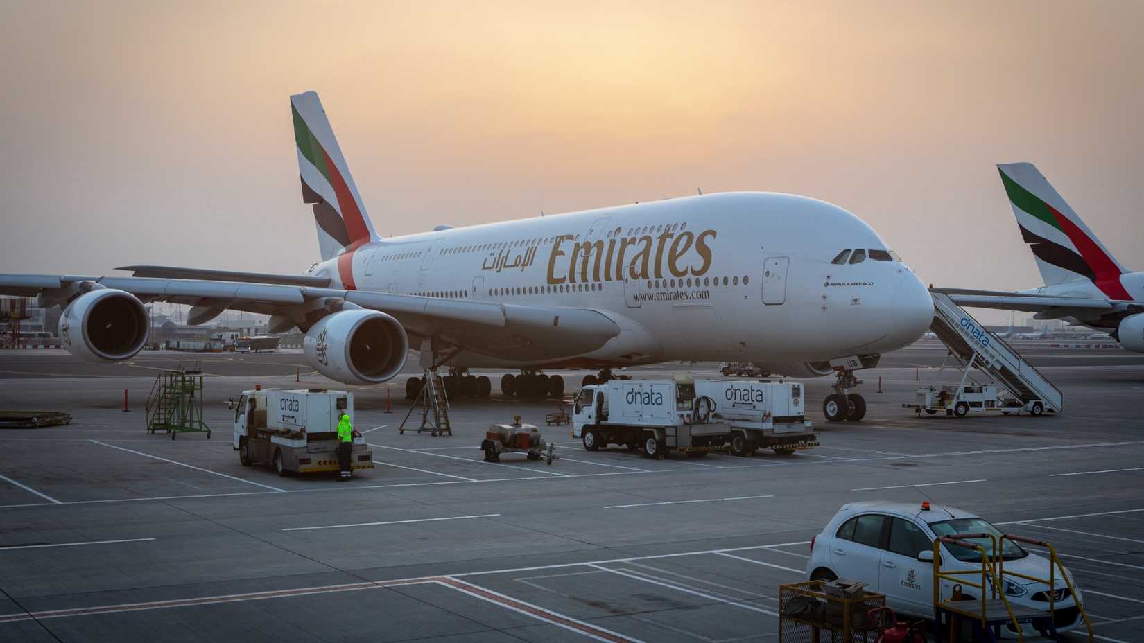 Emirates A380 Parked In Low Light On A Remote Stand In Dubai