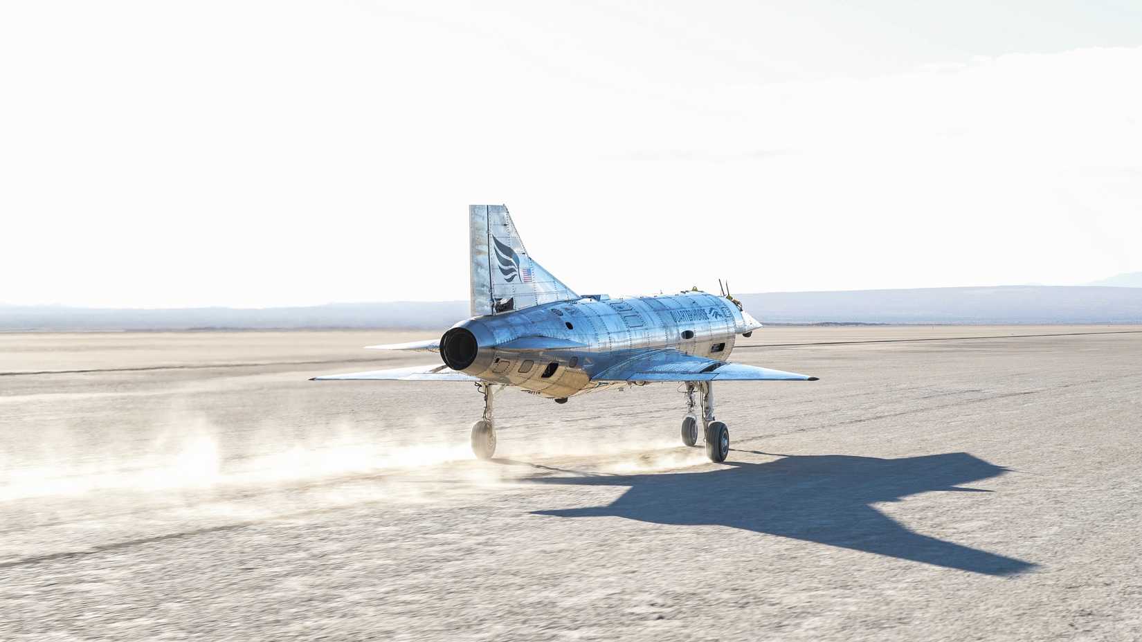 The Mk 1 Quarterhorse, a remotely piloted aircraft designed by Hermeus departs from Rogers Dry Lake during testing at Edwards Air Force Base.