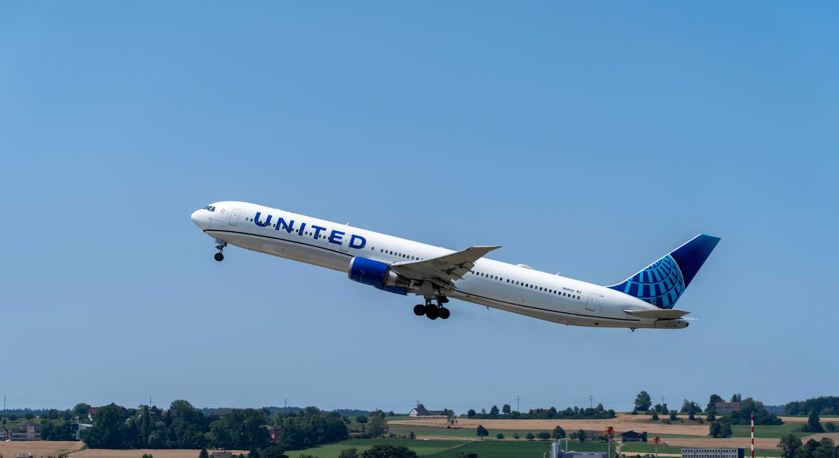 United Boeing 777 takes off at ZRH international airport.