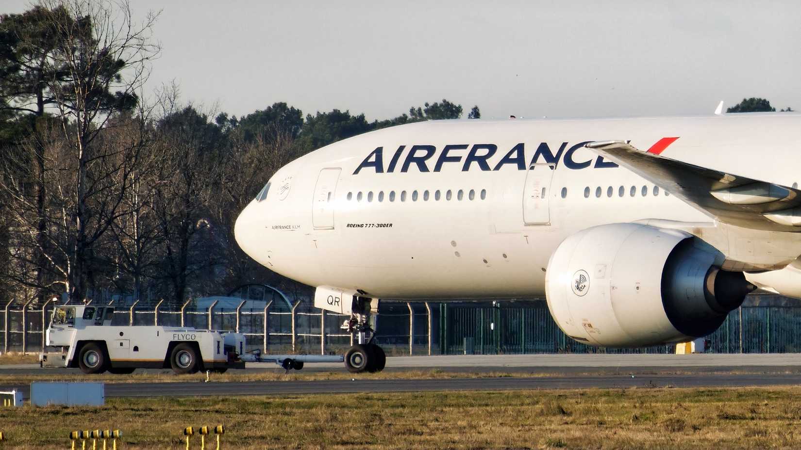 Air France 472-seat Boeing 777-300ER being towed