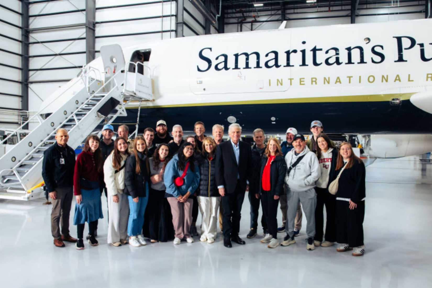 Samaritan's Purse DC-8 Parked Behind Liberty University students