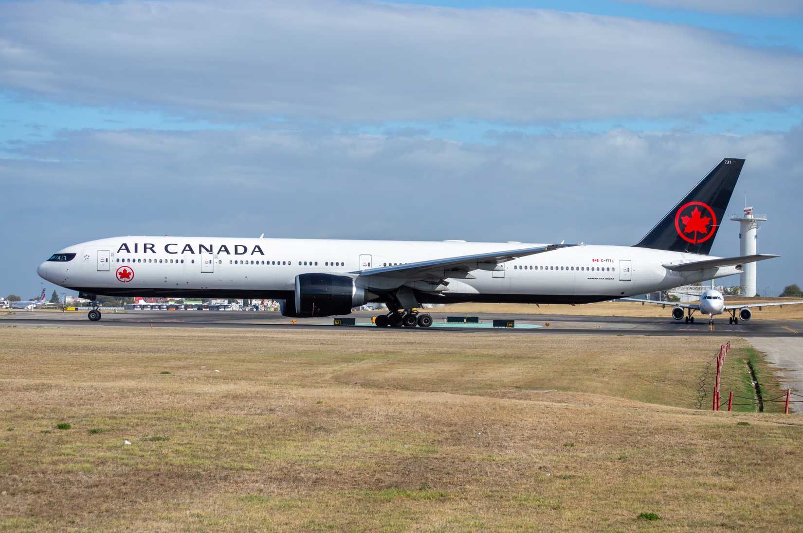 Air Canada Boeing 777 airliner waiting for takeoff at Lisbon Airport, registration C-FITL.