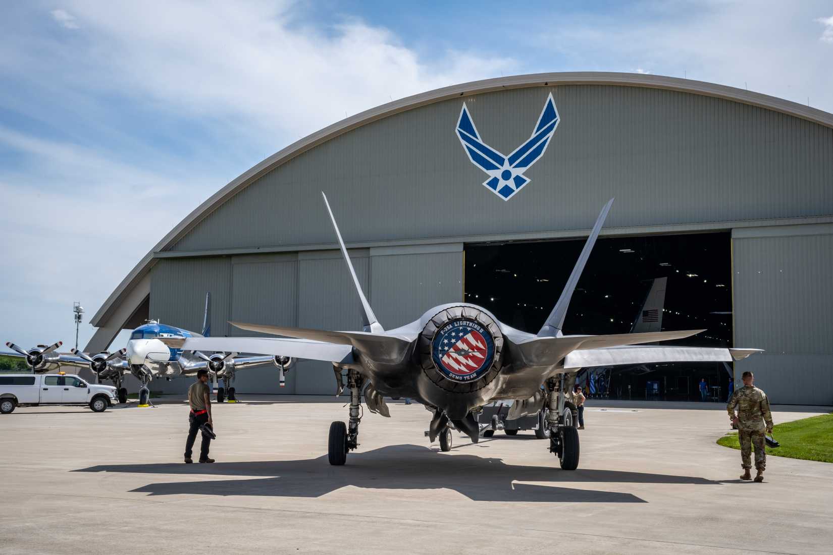 Air Force F-35A Lightning II aircraft, assigned to the 4th Fighter Squadron, is towed by members of the 34th Fighter Generation Squadron.