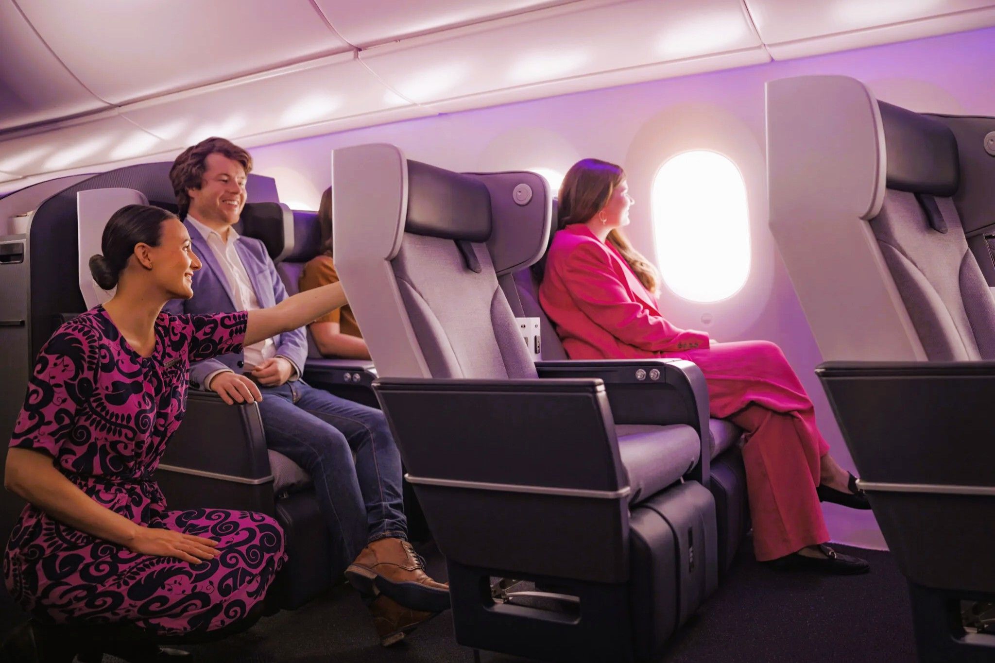 Air New Zealand premium economy seat with generous pitch.