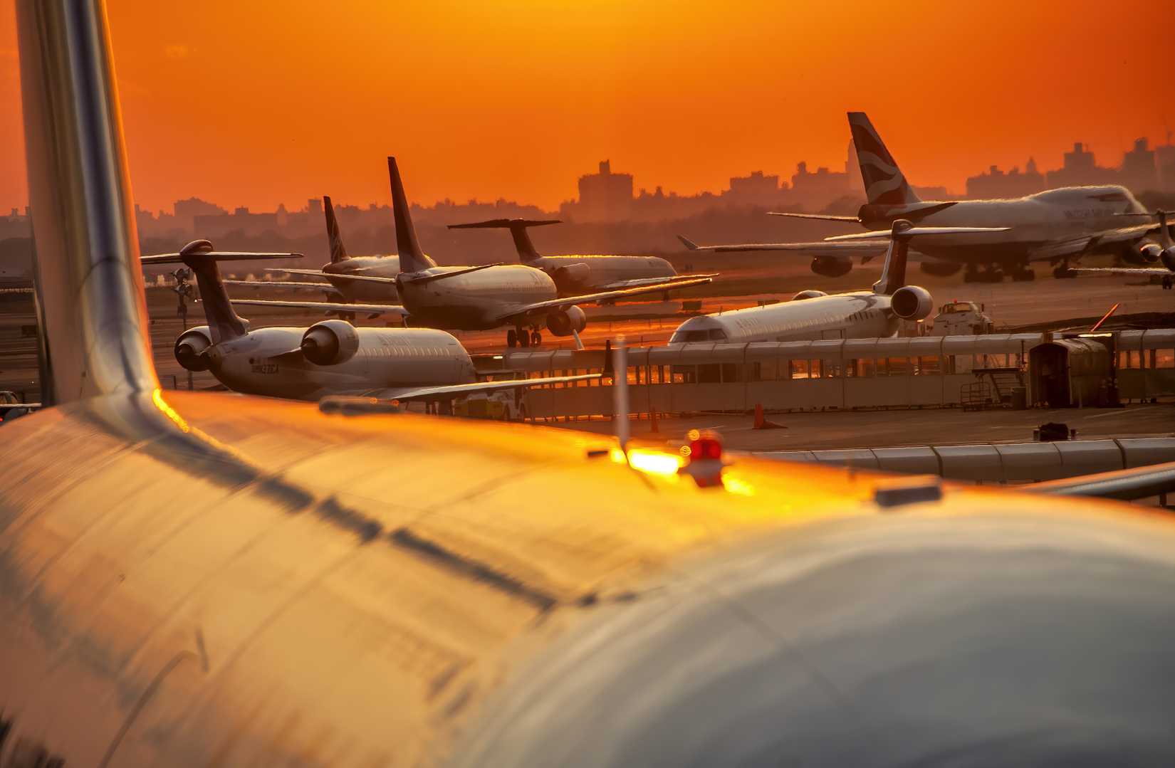 Airplanes at sunset along the taxiways at JFK