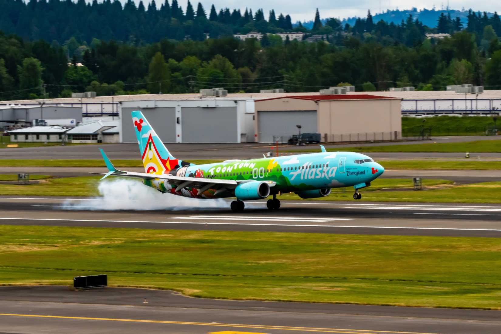 Alaska Airlines' Boeing 737-800 Toontown Smoking the Portland International Airport Runway.-1