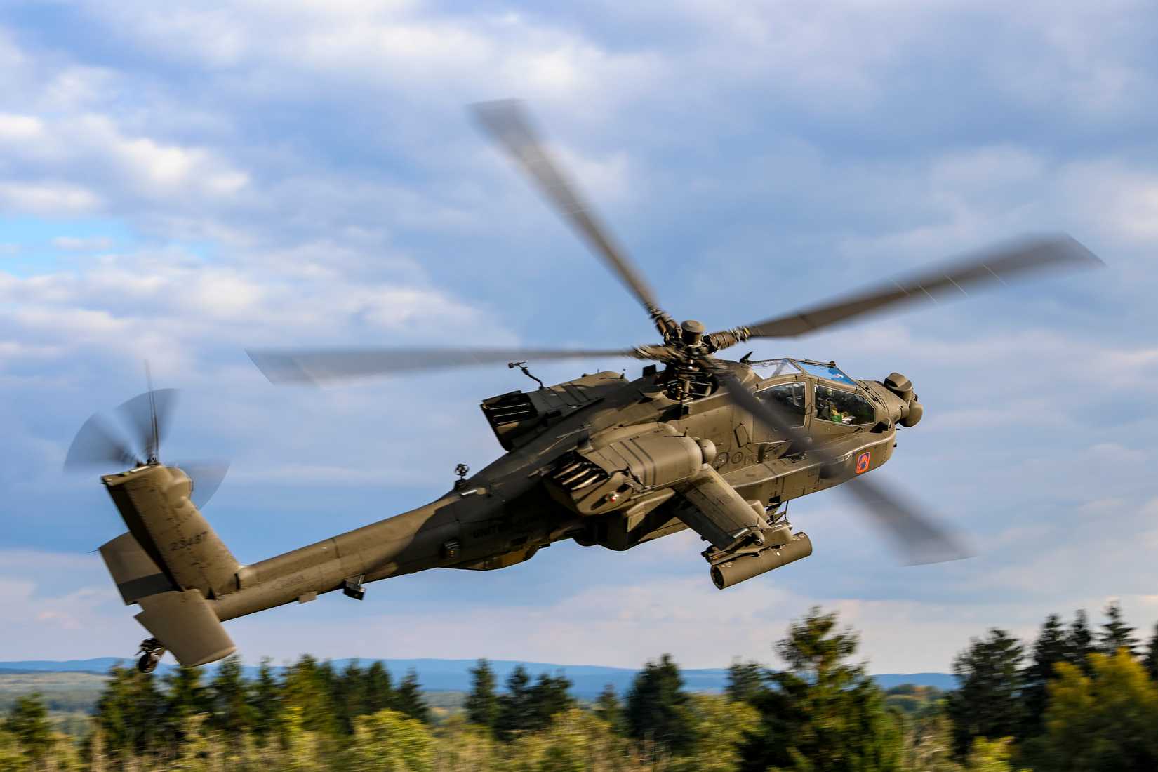 An AH-64E Apache crew, assigned to 1-3 Attack Battalion, 12th Combat Aviation Brigade.