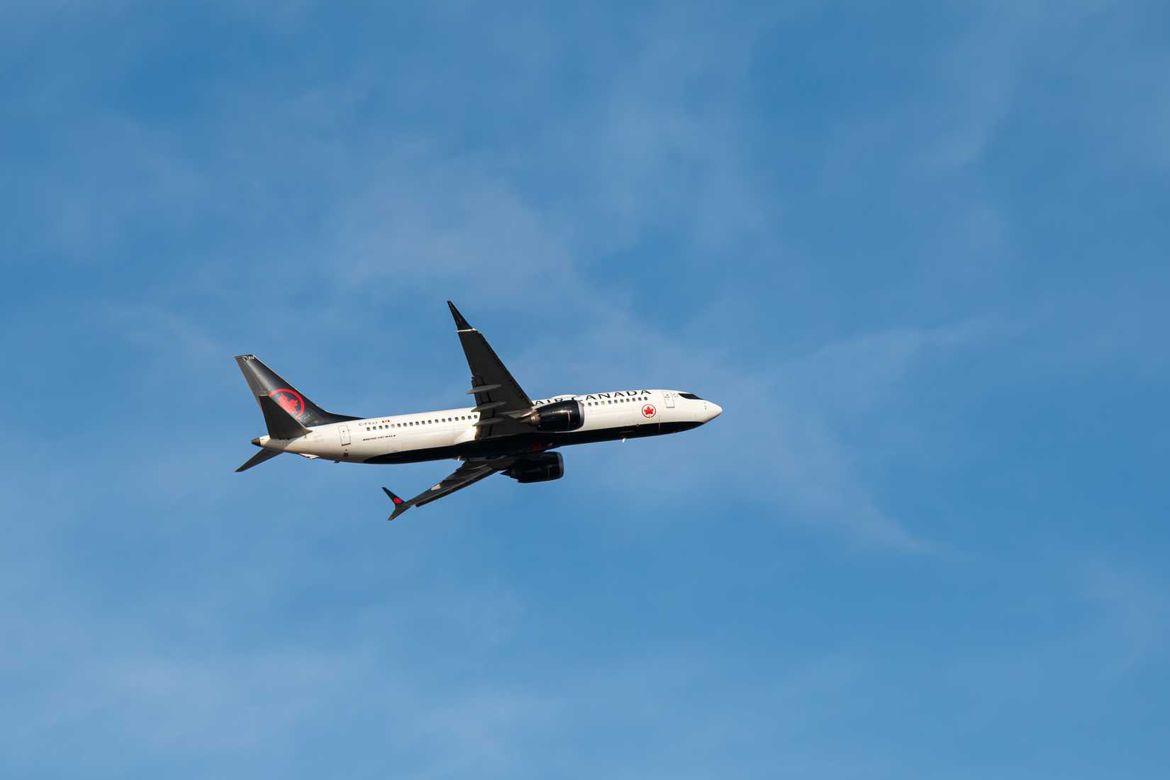 Boeing 737 of Air Canada is in mid-air after takeoff from the Vancouver International Airport