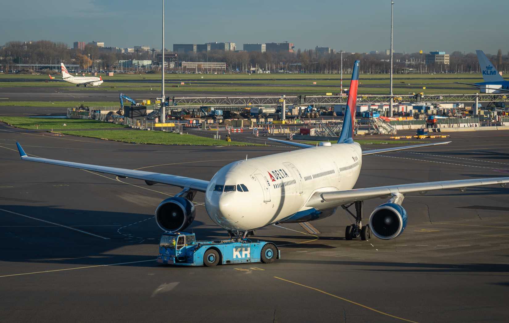 Delta Air Lines Airbus A330 is Towed Towards the Runway at Schiphol Airport Amsterdam