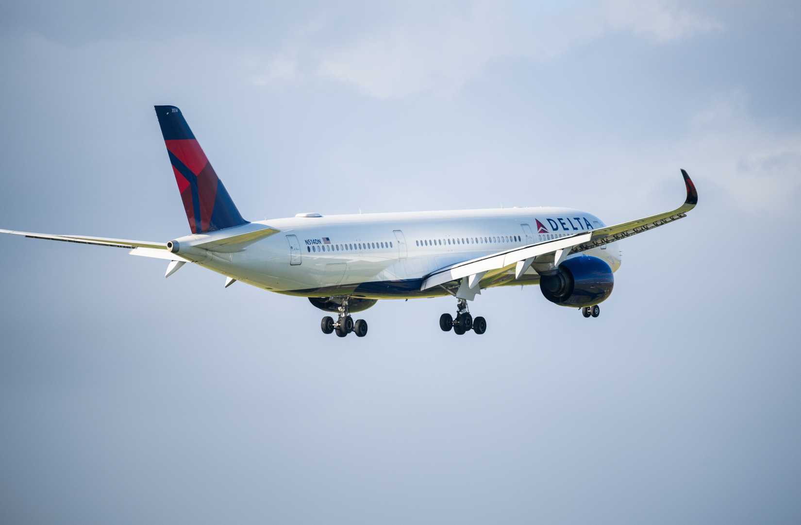 Delta Air Lines N514DN Airbus A350-941 flying towards Auckland International Airport.