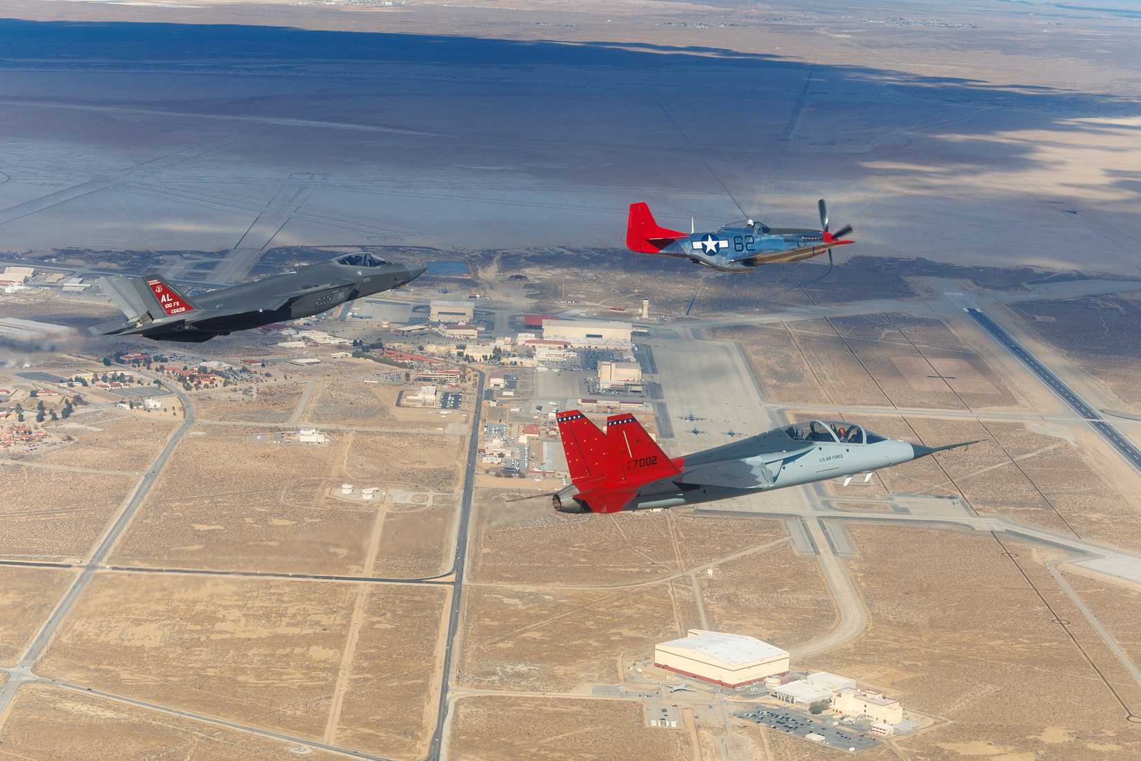 Edwrds AFB, A T-7A Red Hawk from the 416th Flight Test Squadron, F-35A from the Alabama Air National Guard and P-51D Mustang