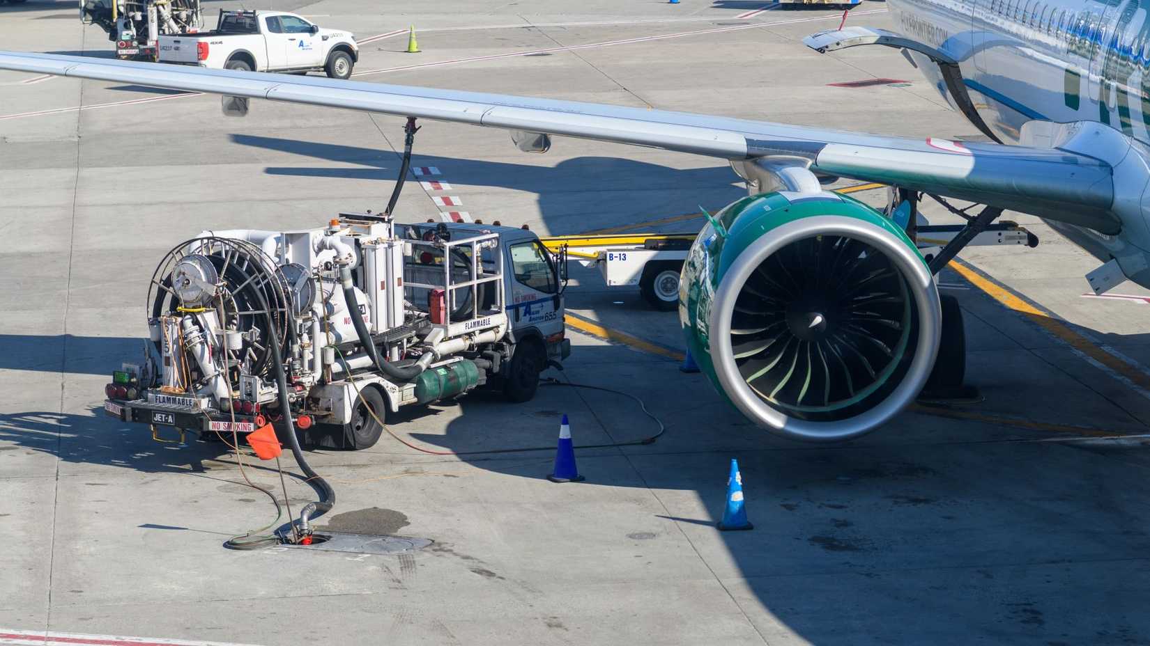 Frontier airplanes being serviced at the tarmac of JFK airport in New York