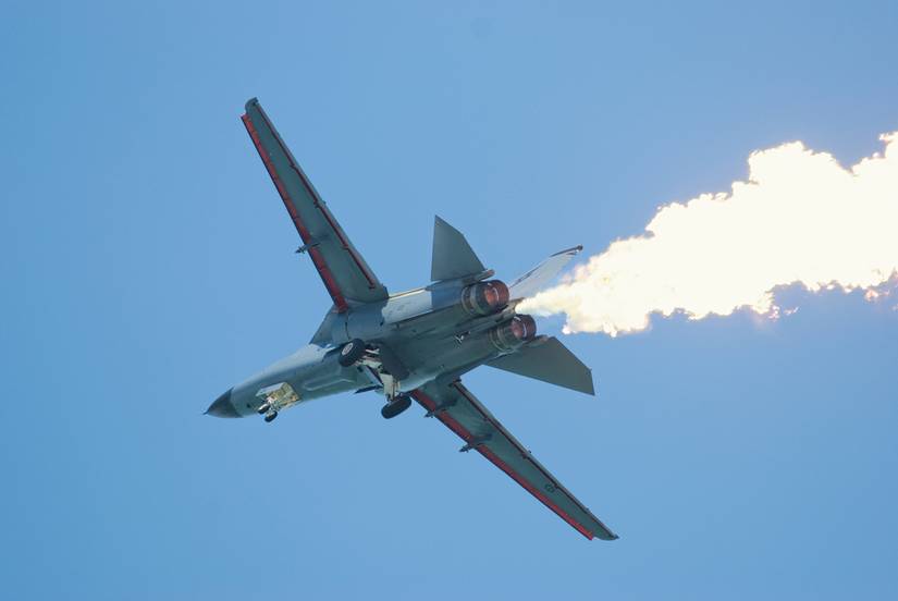 General Dynamics F-111 Aardvark with trailing flames during its aerial display at Singapore Airshow 2010