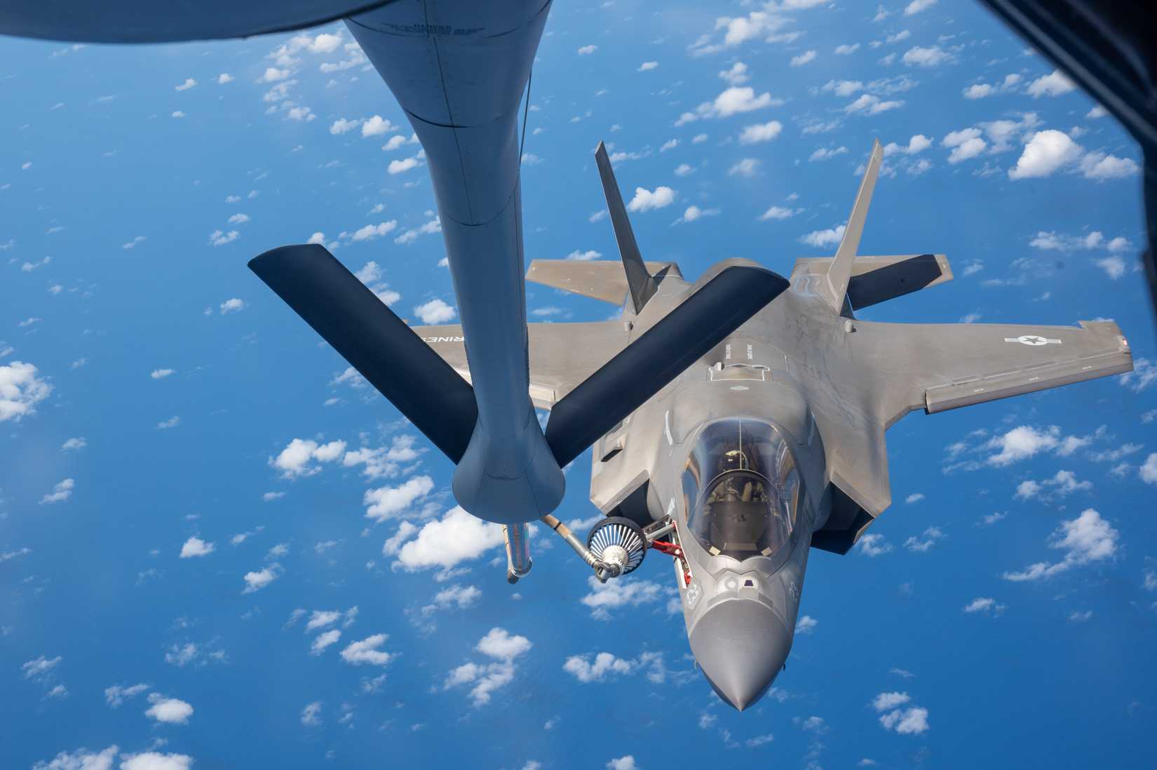 Marine Corps F-35B Lightning II assigned to Marine Fighter Attack Squadron 242 (VMFA-242), receives fuel from a KC-135 Stratotanker