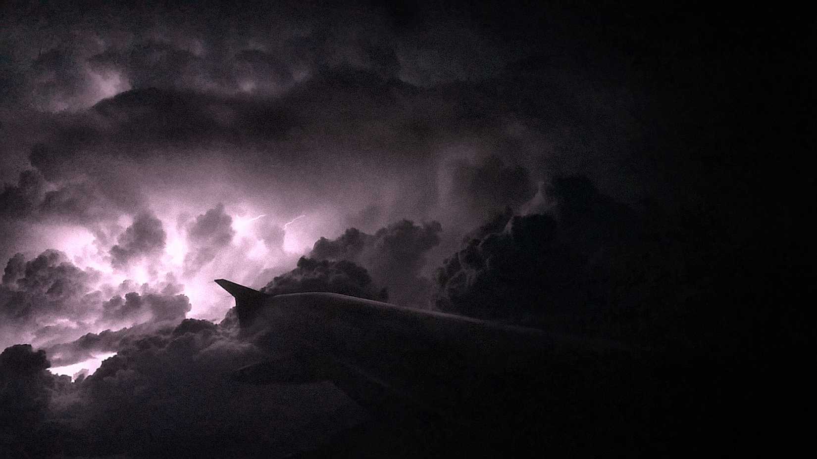 An aircraft flies through a severe storm