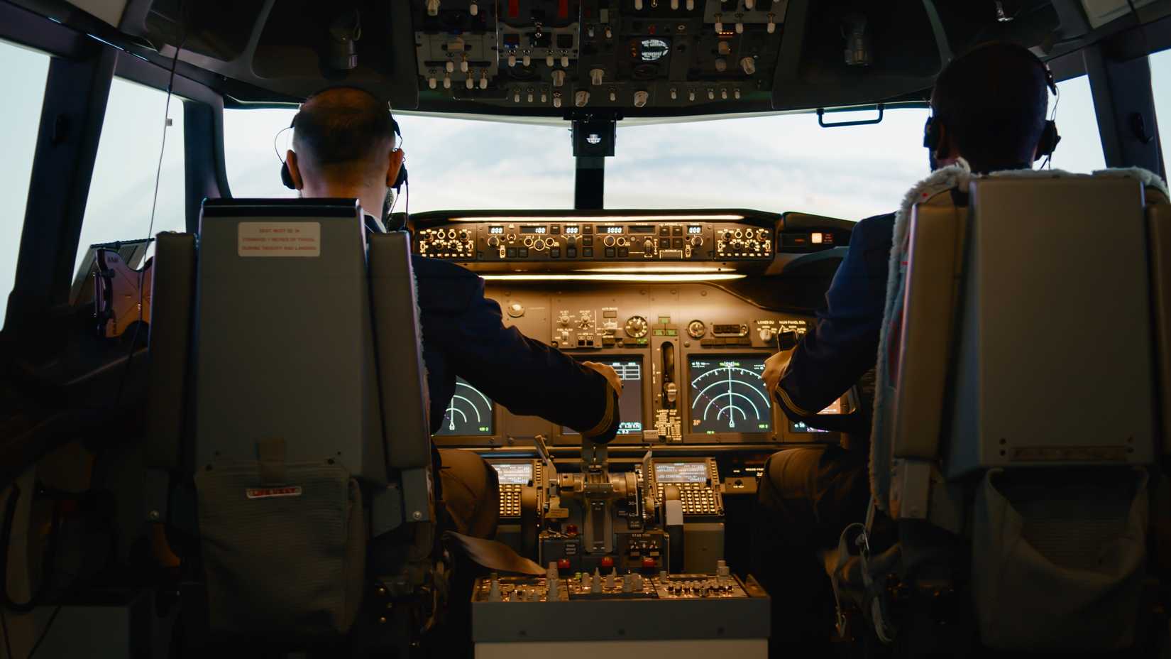 Pilots In Cockpit