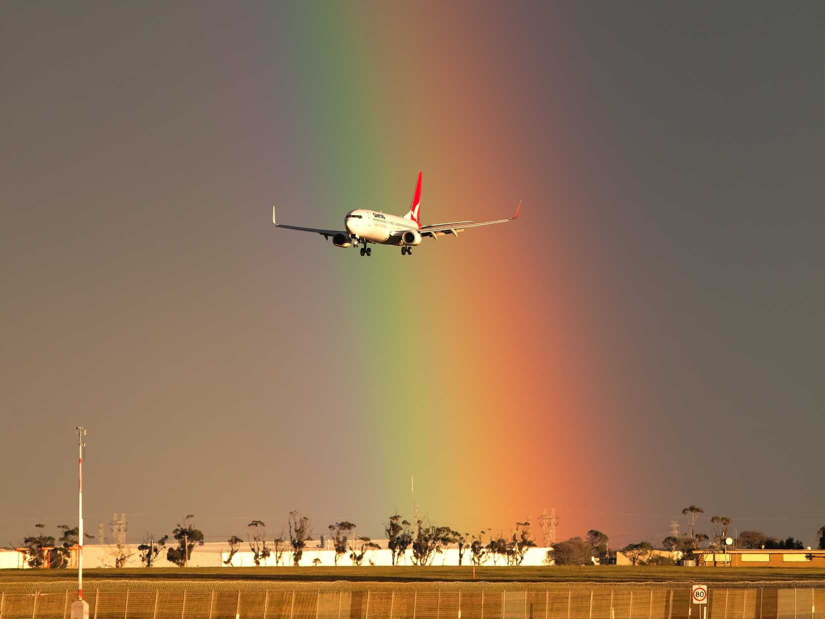 Qantas 737 Landing In Melbourne With Rainbow