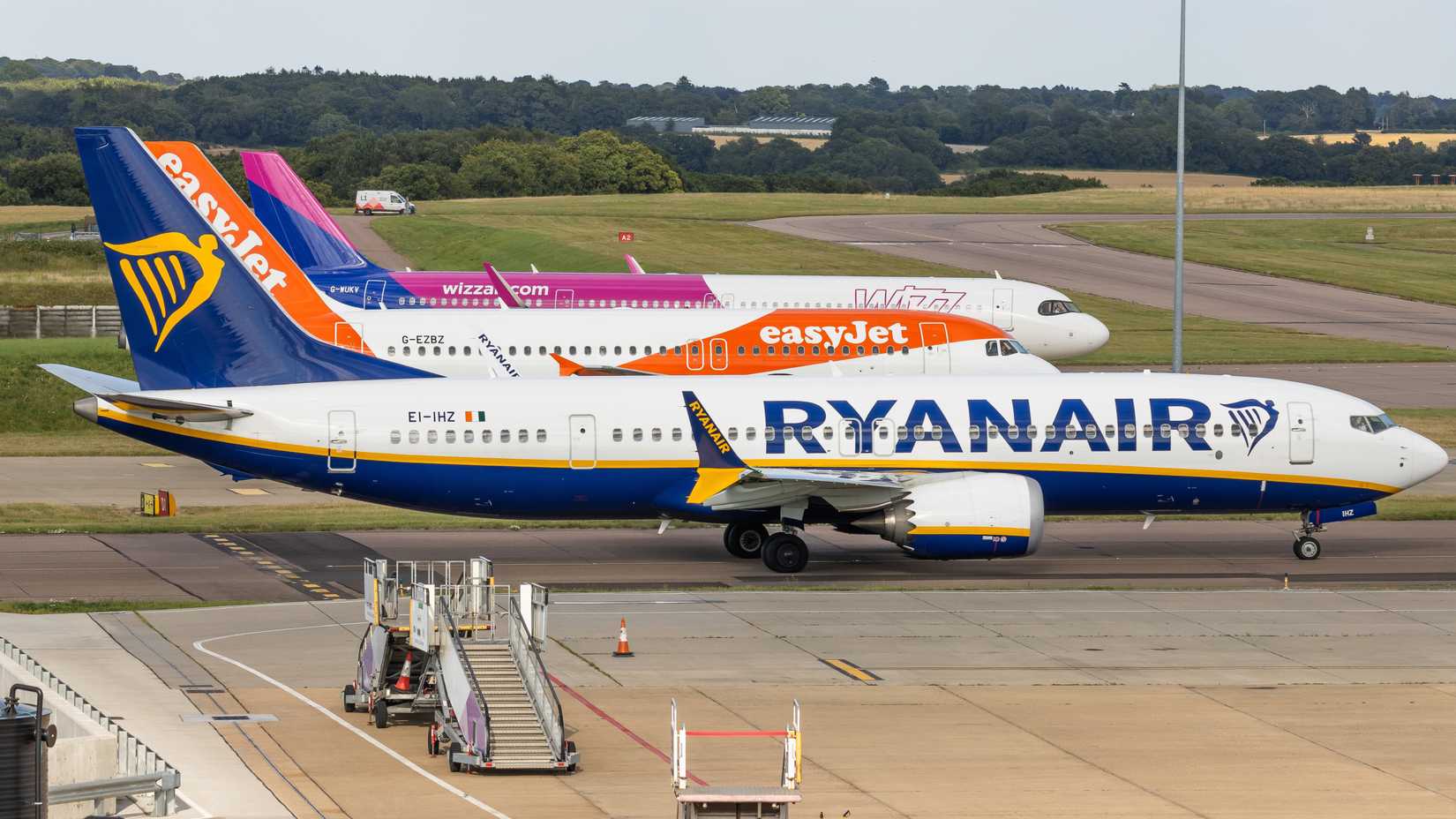 easyjet, wizz and ryanair planes on the apron