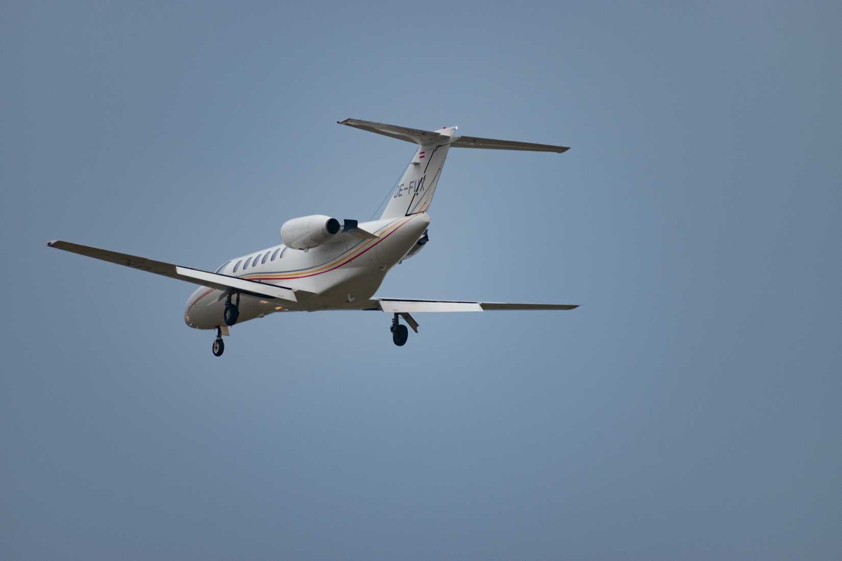 A Cessna C550 Private Jet Cruising Through The Sky