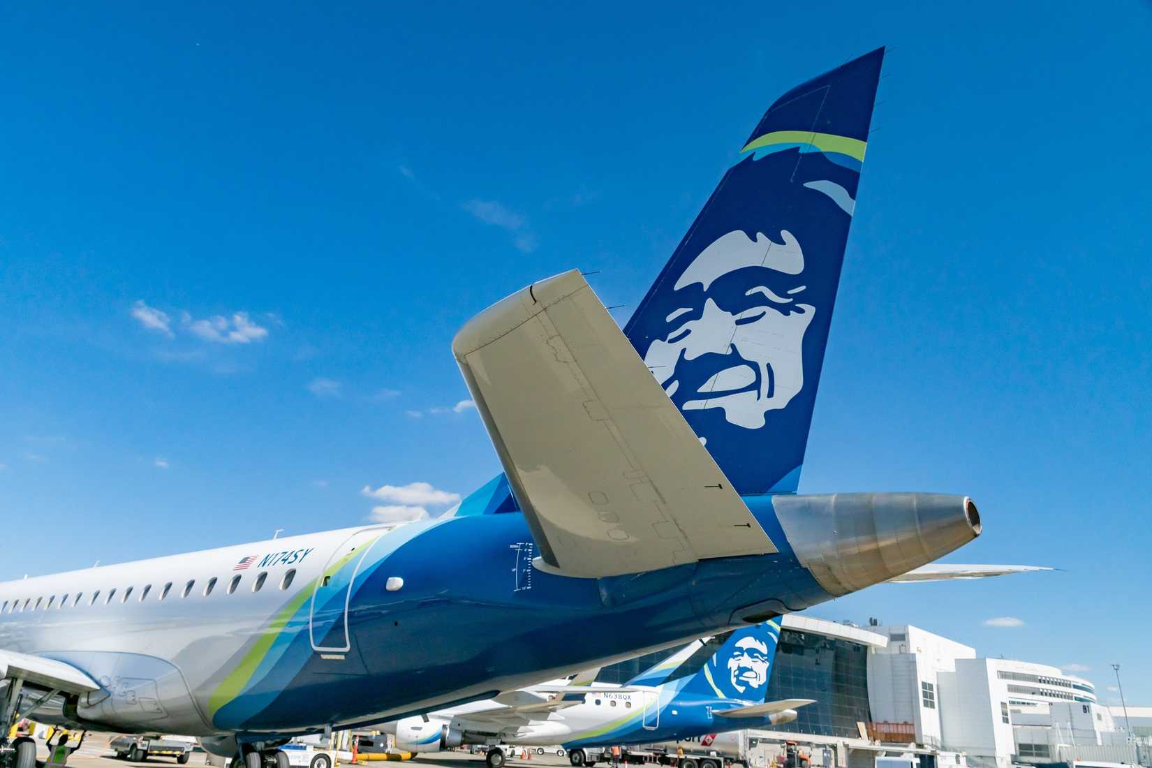 Two Alaska Air Group Embraer E175s In Front of Seattle-Tacoma International Airport (KSEA)