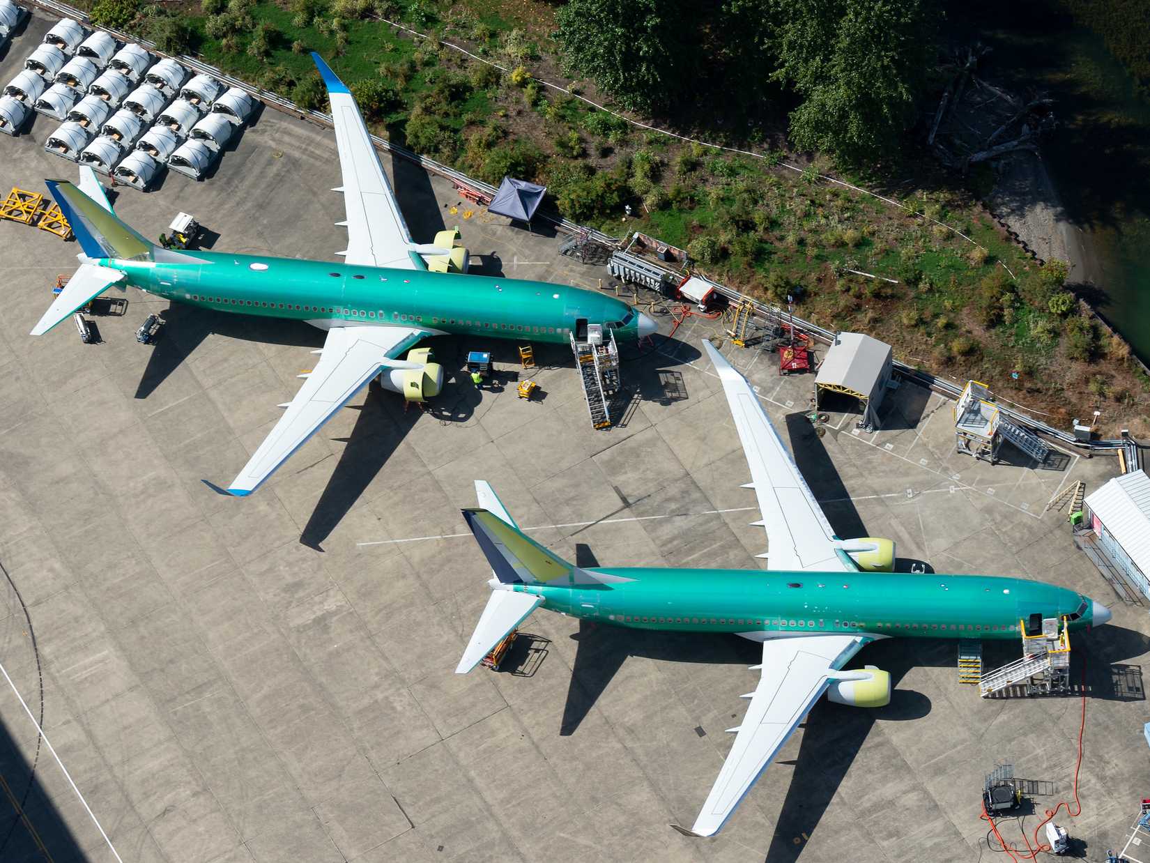 Two Boeing 737 NG parked outside the company factory at Renton Airport.