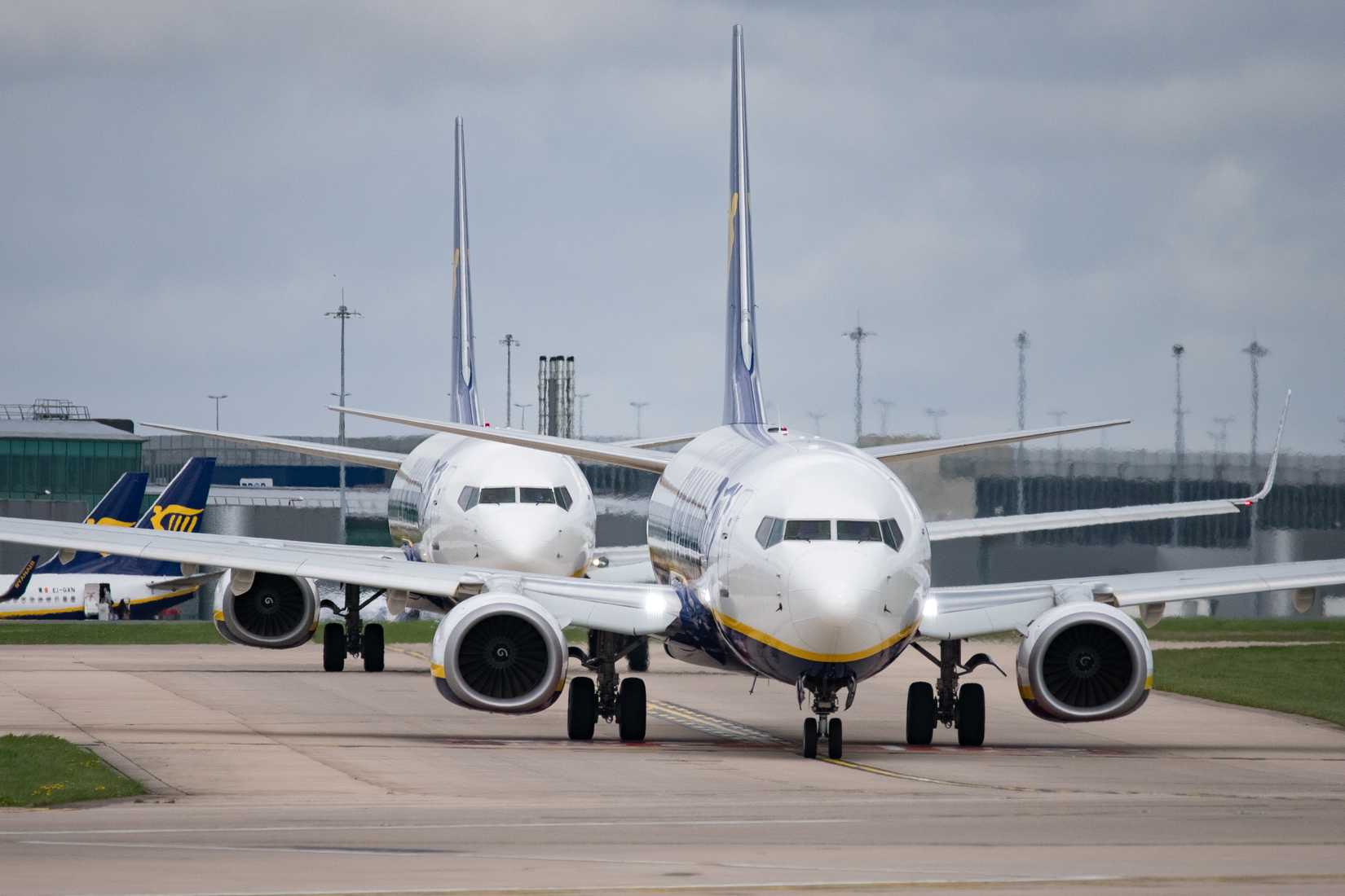 Two Ryanair 737s taxiing out at Manchester Airport.