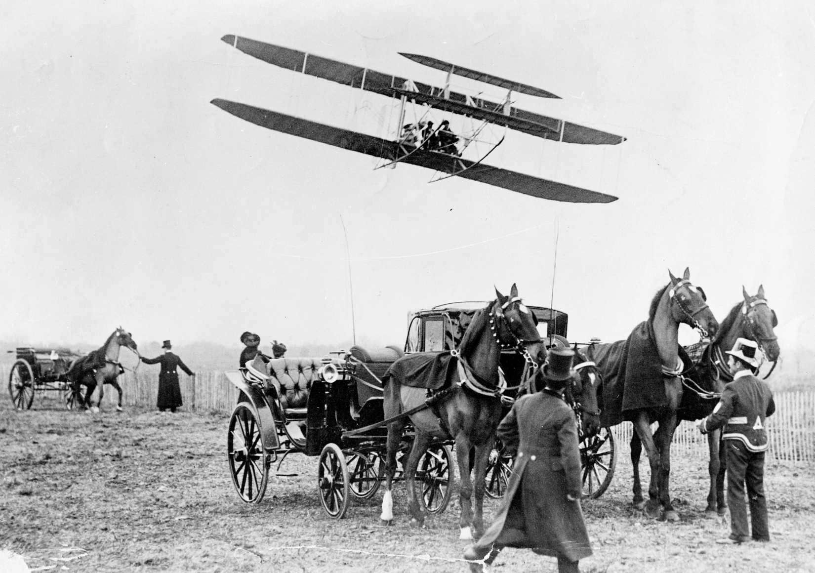 Wilbur Wright flying his first successful aircaft design.