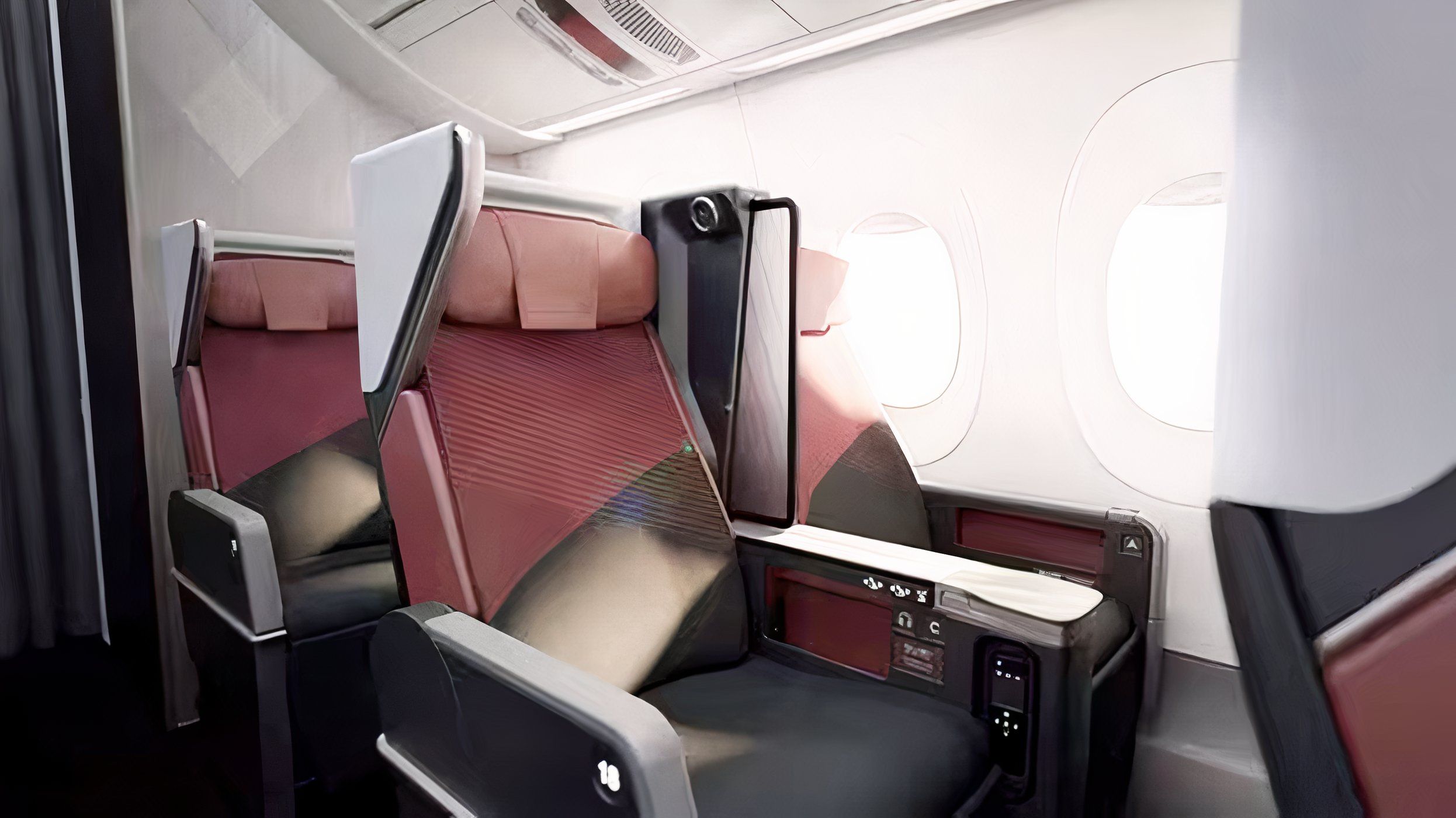 Japan Airlines premium economy cabin seat on long-haul aircraft.