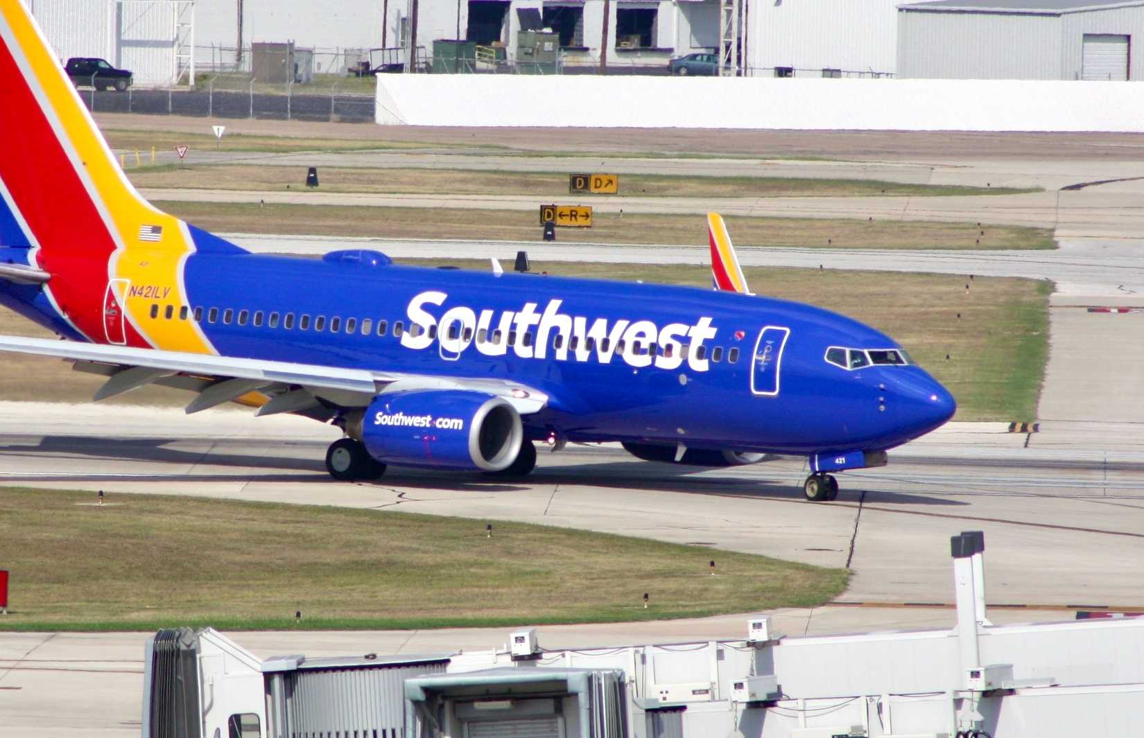 A Boeing 737-700 of Dallas-based Southwest Airlines exiting the runway after landing at San Antonio International Airport.