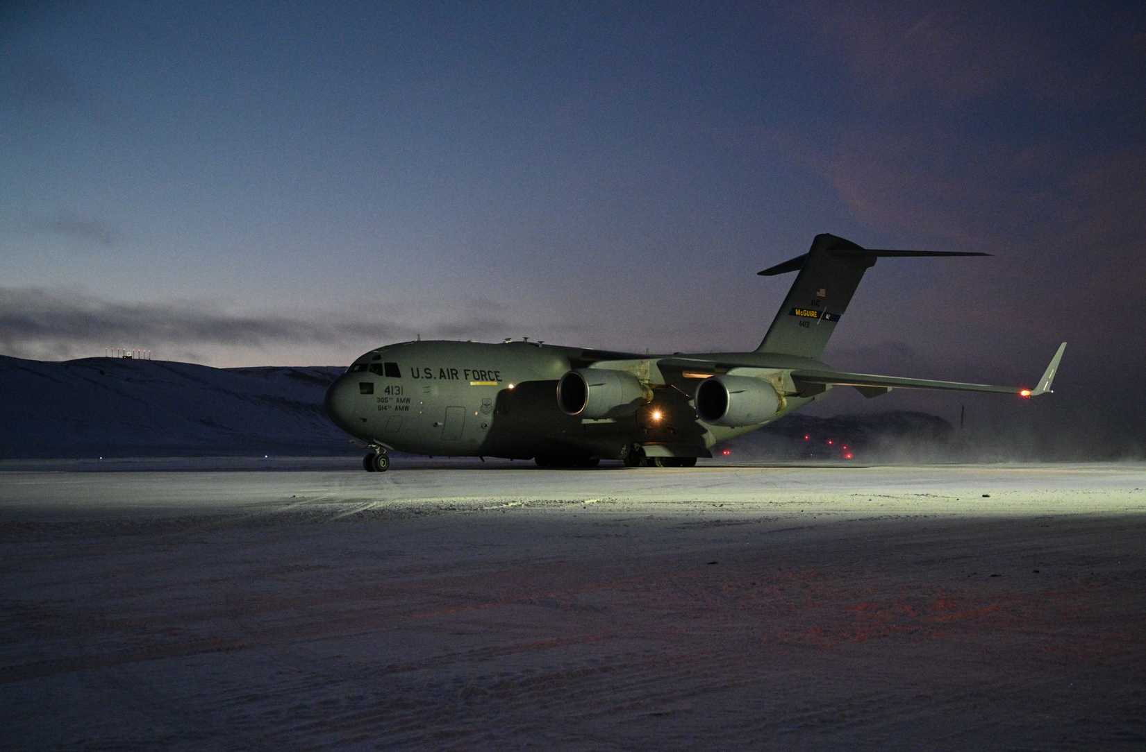 A C-17 Globemaster III delivers Airmen and cargo during Operation NOBLE DEFENDER at Pituffik Space Base, Greenland, Jan. 27, 2025.