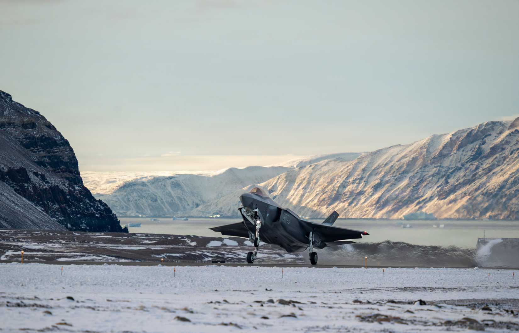 A F-35 Lightning II fighter aircraft from the 115th Fighter Wing lands at Pituffik Space Force Base, Greenland, Oct. 7, 2025.