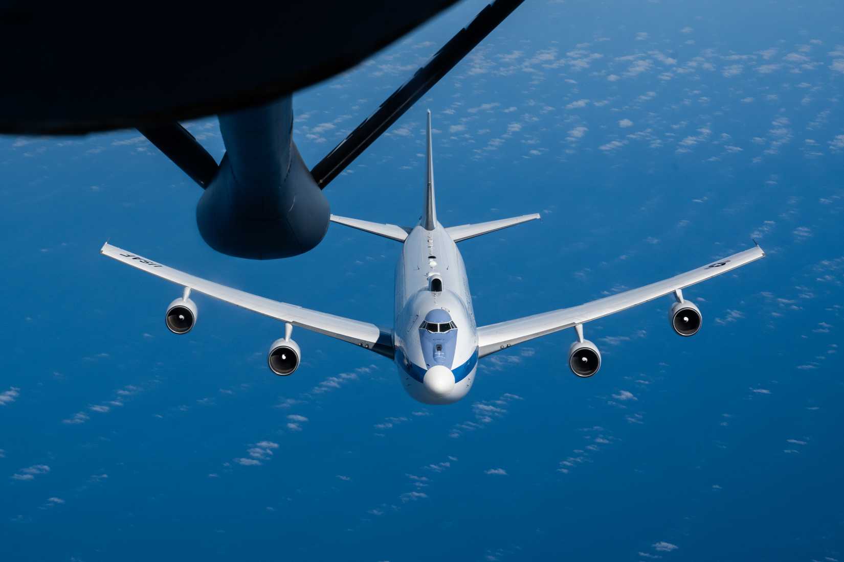 Air Force E-4B Nightwatch from the 95th Wing, Offutt Air Force Base, Neb., descends after receiving fuel from a KC-135 Stratotanker