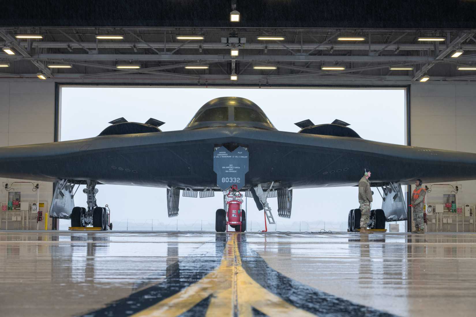Airmen assigned to the 393rd Bomber Generation Squadron prepare a B-2 Spirit aircraft for flight.