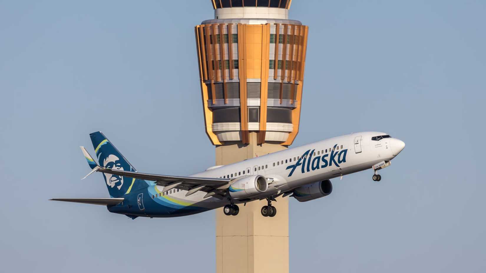Alaska Airlines Boeing 737-900ER airplane at Phoenix airport in the United States.