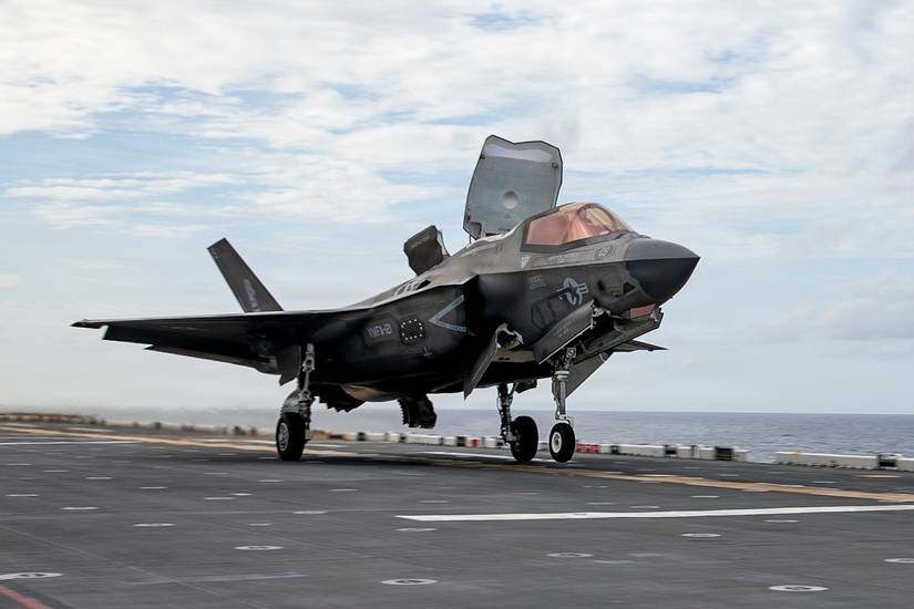 An F-35B Lightning II takes off from the flight deck of USS Tripoli (LHA 7)