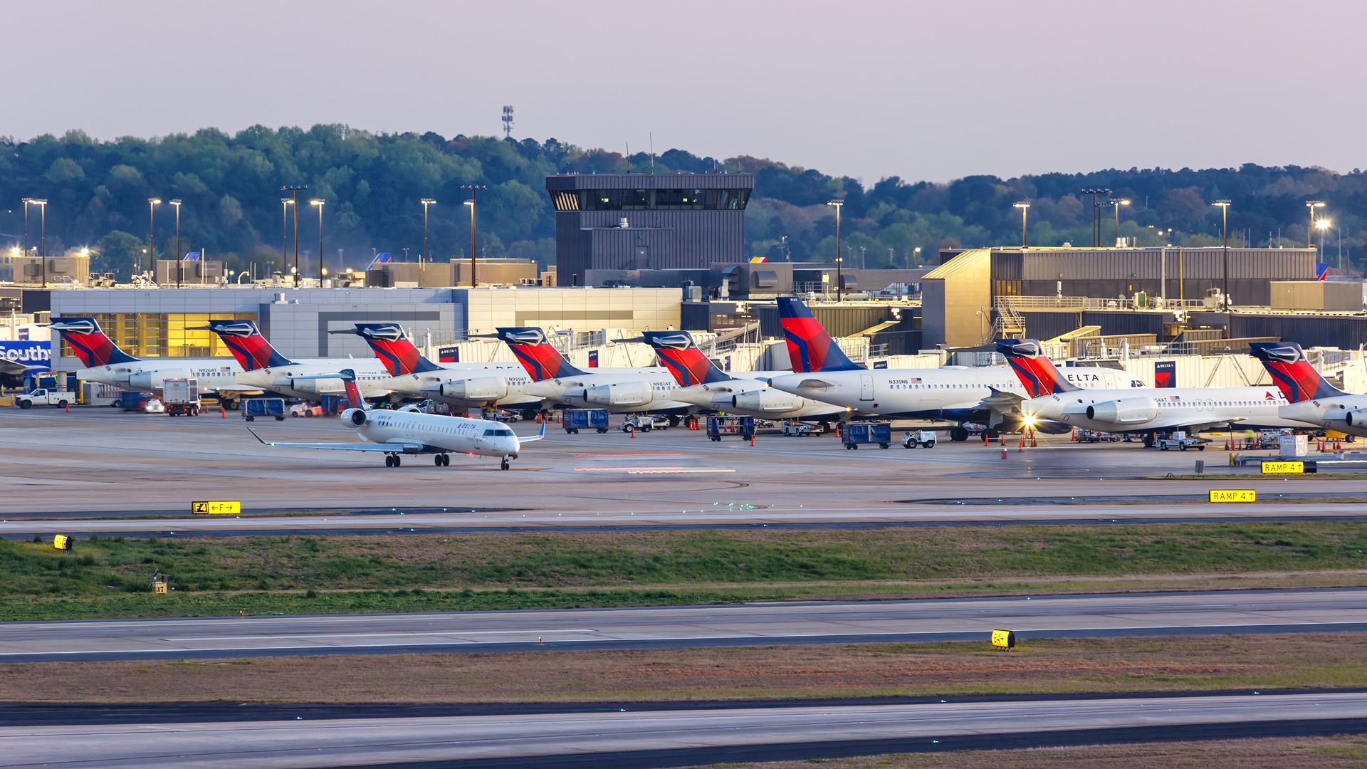 Watch: Hero Bystander Flattens Man Who Charged TSA Agents In Atlanta Airport