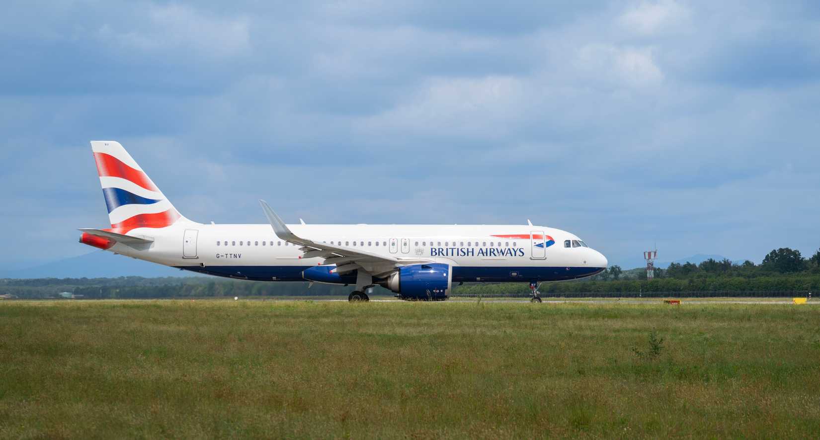 British Airways Airbus A320 is taxiing at MXP Milano Malpensa international airport.